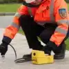 A photograph of the Cable Sniffer being used against a path, to check for faults