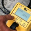 A photograph of our Cable Sniffer and the display unit being used